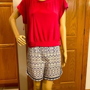 The Limited- white and dark blue with hints of yellow design.